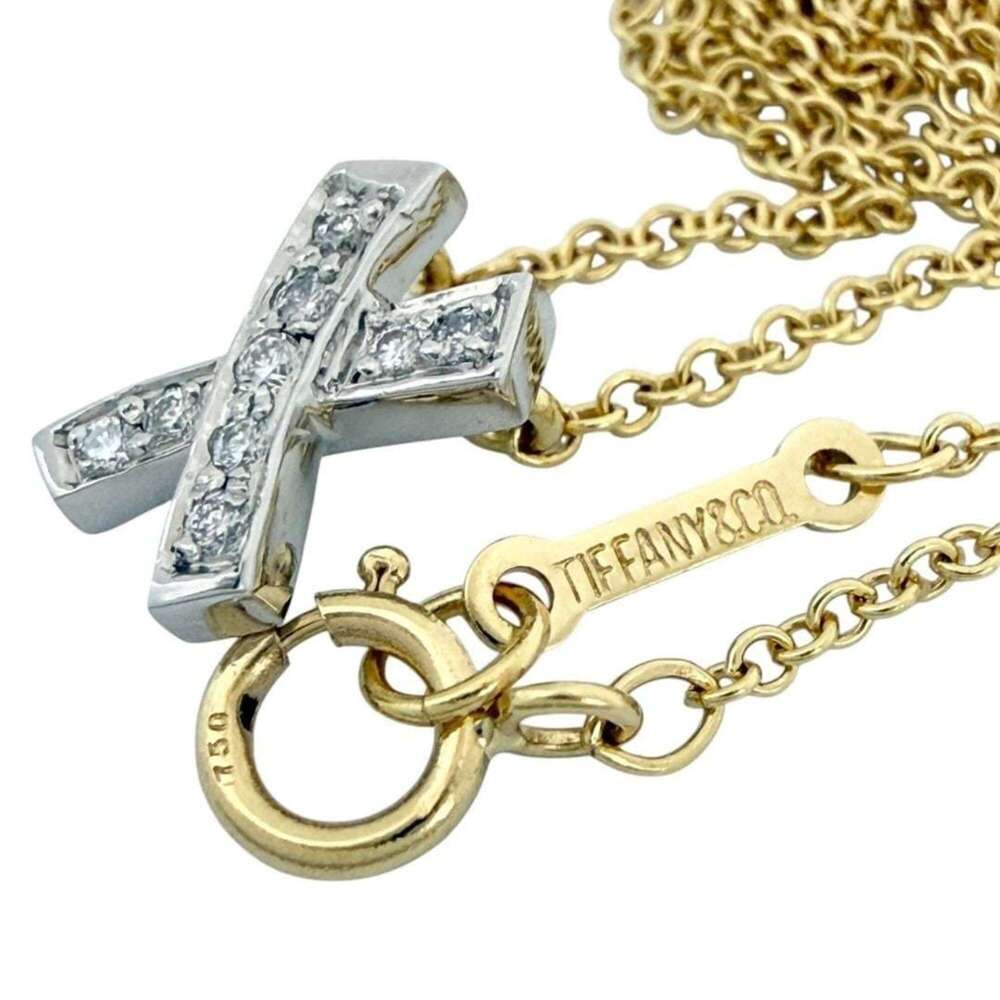 Tiffany & Co. Kiss pendant necklace, 18K gold, platinum, diamonds. - Picture 6 of 10